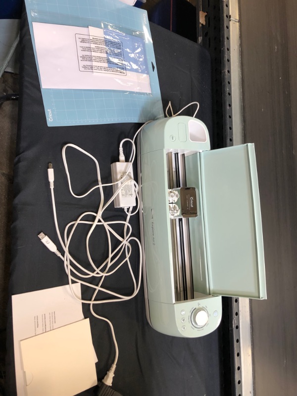 Photo 2 of Cricut Explore Air 2 - A DIY Cutting Machine for all Crafts, Create Customized Cards, Home Decor & More, Bluetooth Connectivity, Compatible with iOS, Android, Windows & Mac, Mint 
[unable to test for proper function / has marks and scuffs from previous us