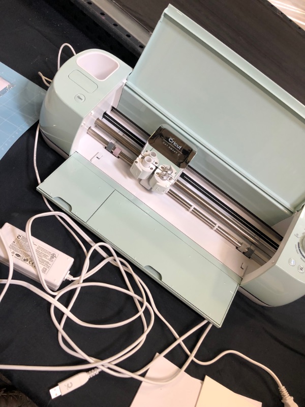 Photo 5 of Cricut Explore Air 2 - A DIY Cutting Machine for all Crafts, Create Customized Cards, Home Decor & More, Bluetooth Connectivity, Compatible with iOS, Android, Windows & Mac, Mint 
[unable to test for proper function / has marks and scuffs from previous us