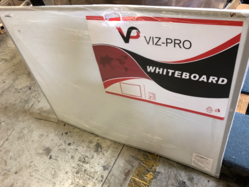 Photo 2 of VIZ-PRO Magnetic Whiteboard/Dry Erase Board, 48 X 36 Inches, Silver Aluminium Frame [ SEEMS LIKE THE DAMAGE IS DUE TO BEING BENT] 
FACTORY SEALED