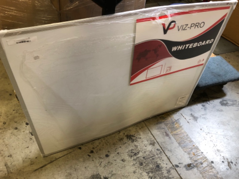 Photo 3 of VIZ-PRO Magnetic Whiteboard/Dry Erase Board, 48 X 36 Inches, Silver Aluminium Frame [ SEEMS LIKE THE DAMAGE IS DUE TO BEING BENT] 
FACTORY SEALED