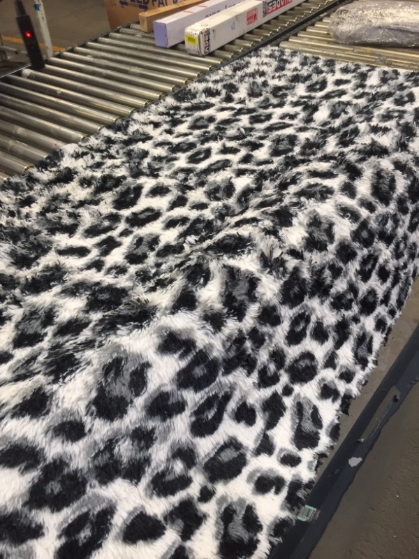 Photo 1 of 72 X 49 AREA RUG ANIMAL PRINT BLACK/WHITE