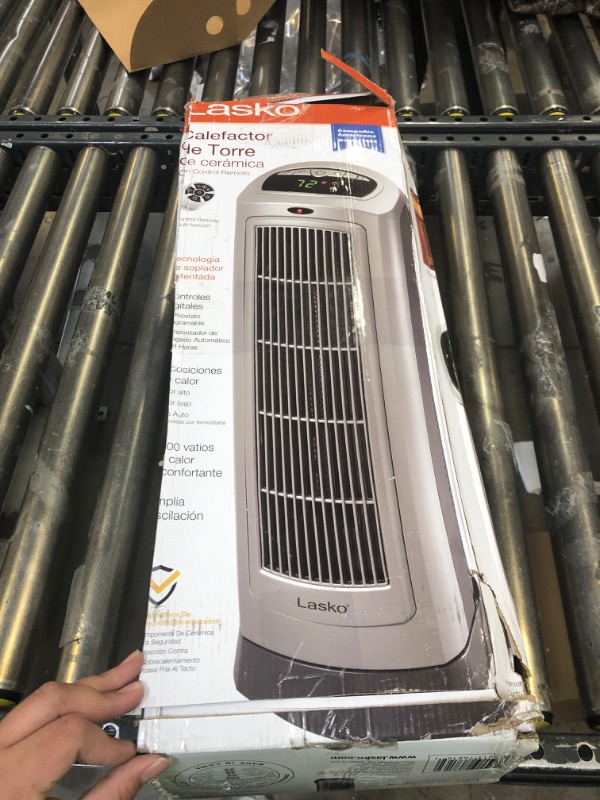 Photo 3 of Lasko 1500W Digital Ceramic Space Heater with Remote, 755320, Silver
NEW -OPEN BOX