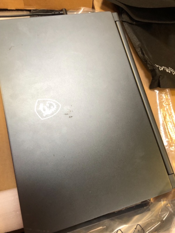 Photo 2 of MSI Stealth 15M Gaming Laptop: 15.6" 144Hz FHD 1080p Display, Intel Core i7-11375H, NVIDIA GeForce RTX 3060, 16GB, 512GB SSD, Thunderbolt 4, WiFi 6, Win10, Carbon Gray (A11UEK-009)
