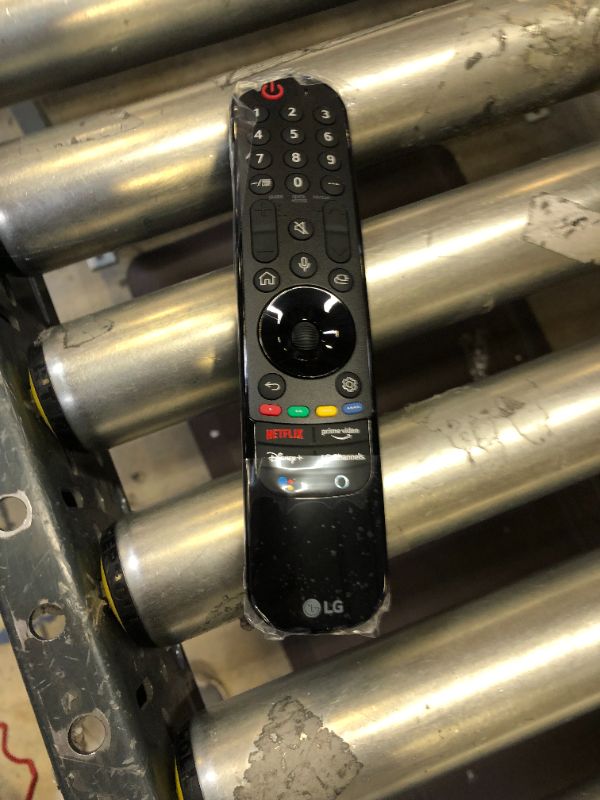 Photo 1 of Samsung TV Remote. 