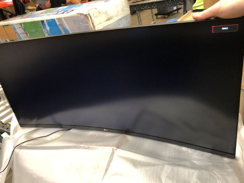 Photo 2 of LG 34WP65C-B 34-Inch 21:9 Curved UltraWide QHD (3440x1440) VA Display with sRGB 99% Color Gamut and HDR 10 and 3-Side Virtually Borderless Display with Tilt/Height Adjustable Stand -Black. No Foam Packaging inside Box Packaging. 
