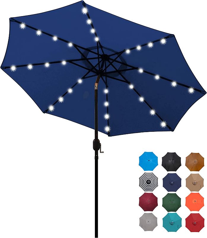 Photo 1 of Blissun 9 ft Solar Umbrella 32 LED Lighted Patio Umbrella Table Market Umbrella with Tilt and Crank Outdoor Umbrella for Garden, Deck, Backyard, Pool and Beach (Navy Blue)