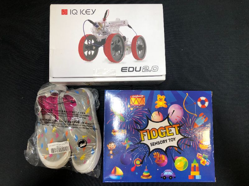 Photo 1 of VARIOUS KID TOYS AND PAIR OF GIRL SHOES SIZE 11 SOLD AS IS!