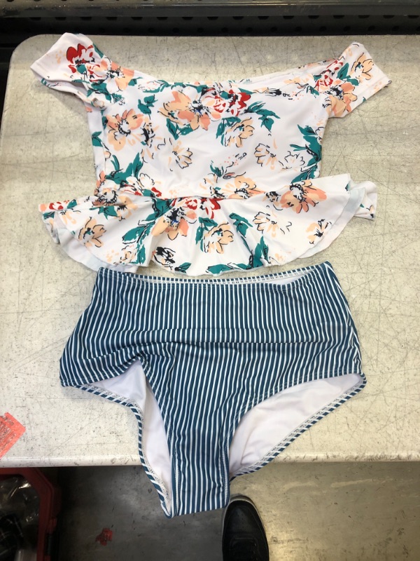 Photo 1 of 2 PIECE SWIMMING SUIT 
SIZE SMALL 