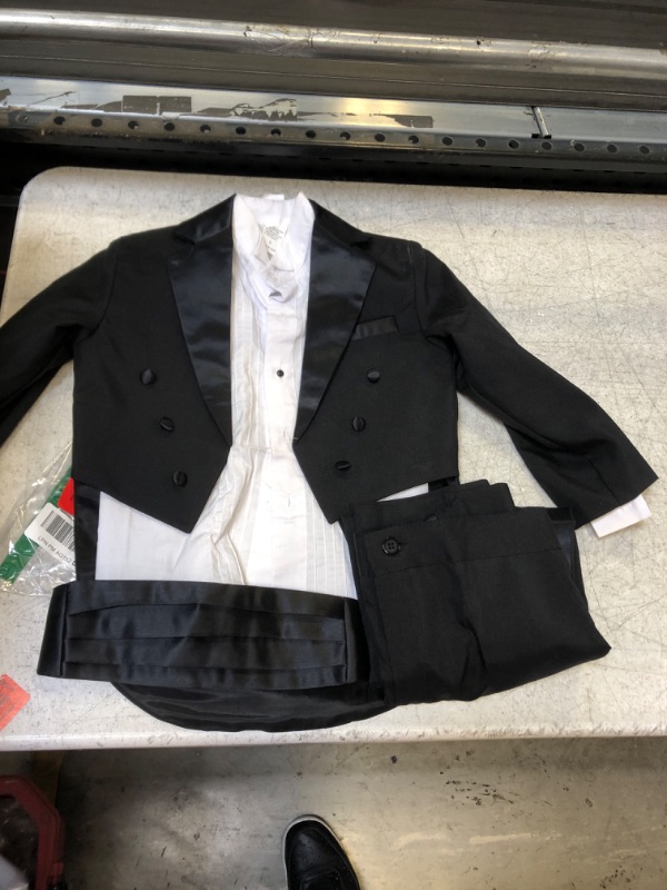 Photo 1 of 4 PIECE KIDS SUIT 
SIZE 5