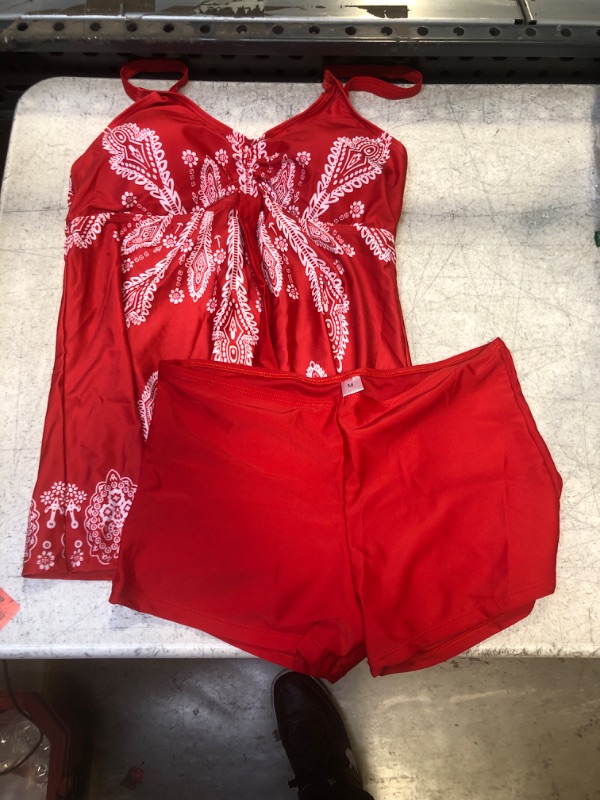 Photo 1 of 2 PIECE SWIMMING SUIT 
MEDIUM 