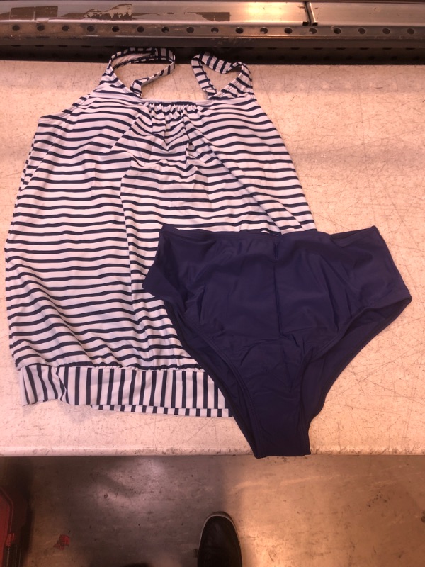 Photo 1 of 2 PIECE SWIMMING SUIT 
MEDIUM 