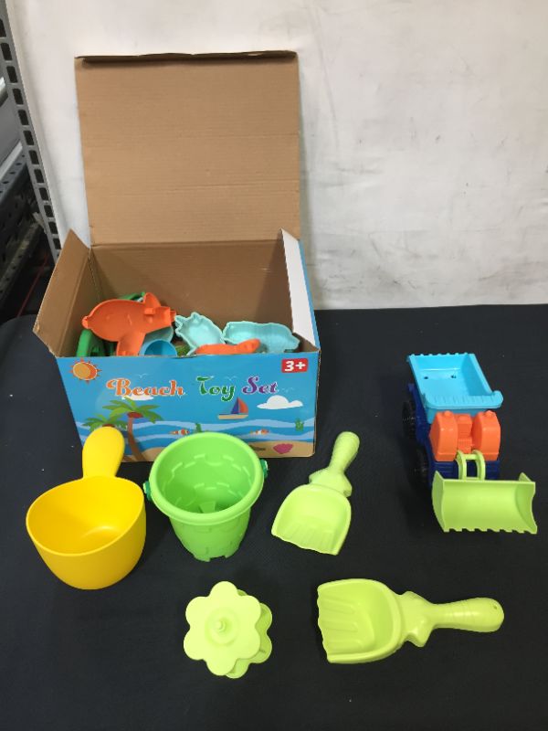 Photo 3 of Beach Sand Toys for Kids, 27 PCS Beach Toys Set With Sand Water Wheel Dump Truck Toy Animal Castle Mold Sandbox Toy Kit with Bucket Beach Shovel Tool Kit with Bonus Mesh Bag for Toddler Summer Outdoor --- missing a couple pieces 
