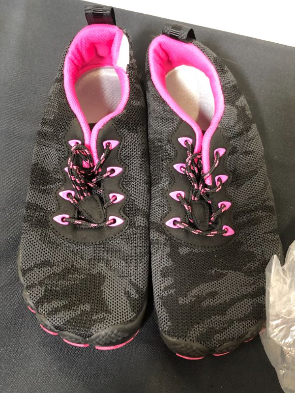 Photo 1 of SWIMMING SHOES WOMENS SIZE 9 BLACK/PINK 
DAMAGED (SEE PICTURE FOR REFRENCE)
