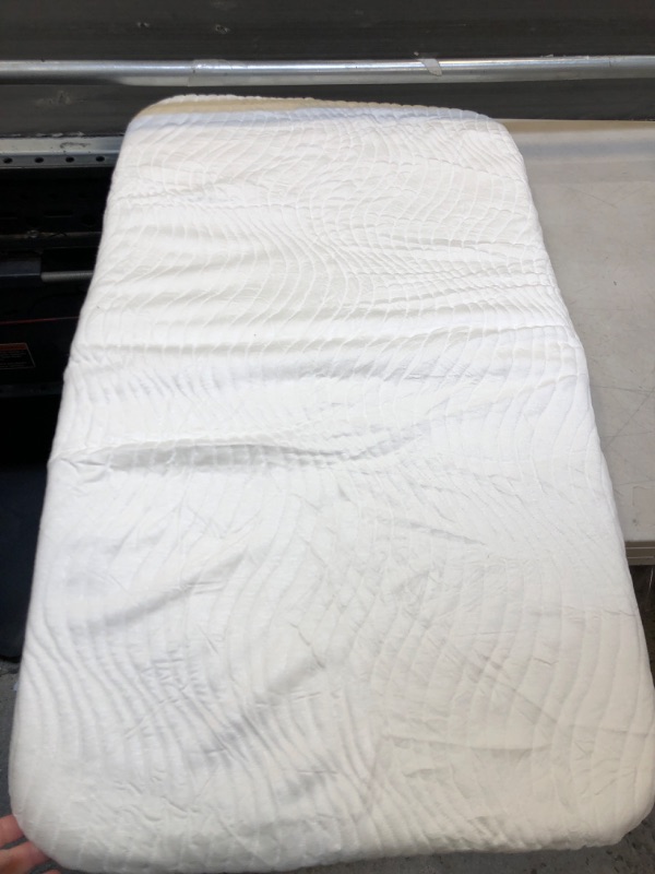 Photo 1 of BABY CHANGING PAD (USED) (MINOR STAINS)