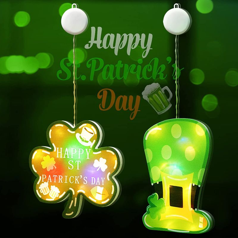 Photo 1 of 2 Pack St. Patrick's Day Decorations Window Lights with Suction Cups, Battery Operated Irish Saint Patricks Day Shamrocks Leprechaun Hat Lights with Timer for Window Wall Door Home Party Decorations
