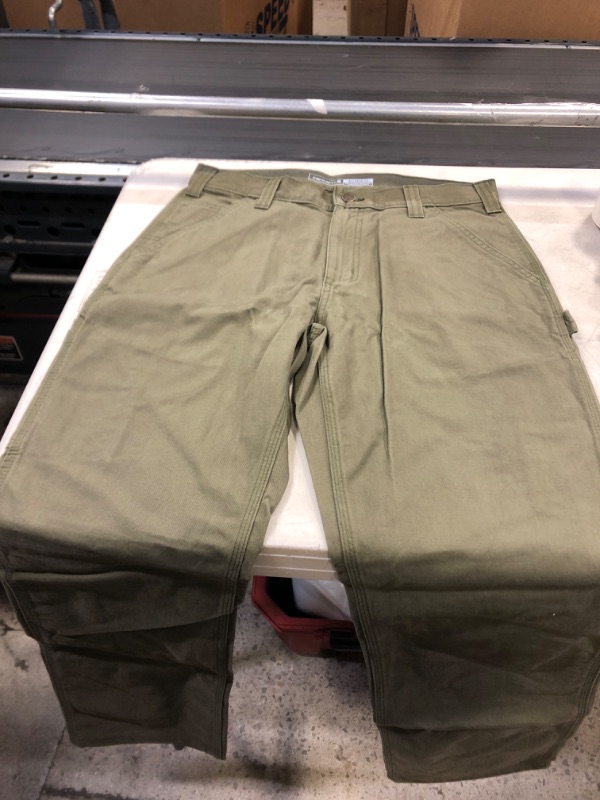 Photo 3 of CARHARTT WIP GREEN STONE PANTS 
31X 34 INCH 