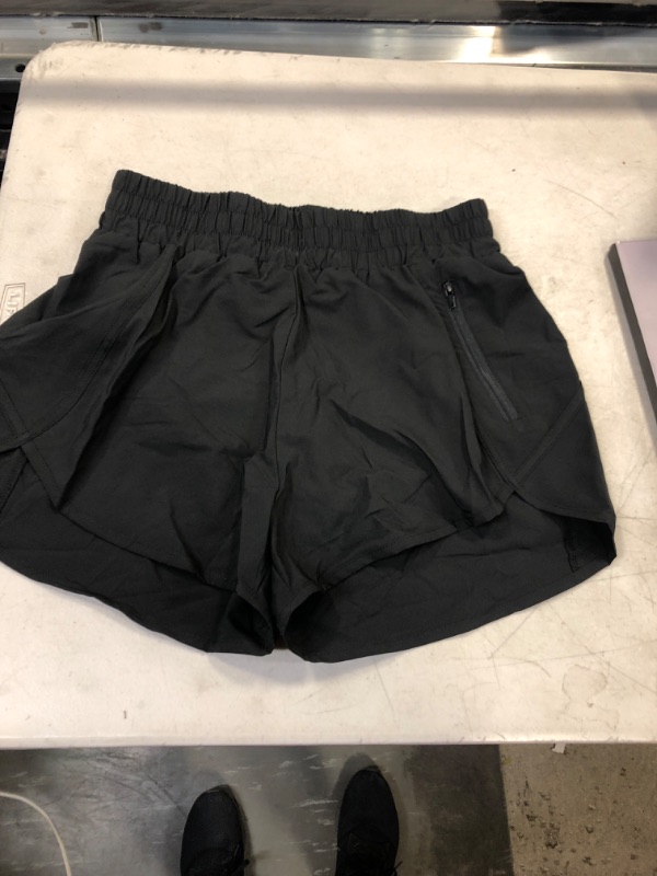 Photo 1 of 
black running shorts size girl