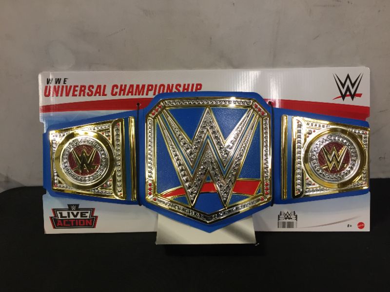 Photo 2 of WWE Championship Title Featuring Authentic Styling, Metallic Medallions, Leather-Like Belt & Adjustable Feature That Fits Waists of Kids 8 and Up
