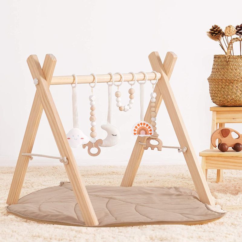 Photo 1 of little dove Wooden Baby Gym with 6 Gym Toys Foldable Play Gym Frame Activity Gym Hanging Bar Baby Developmental Toy Montessori (Gym with mat)
