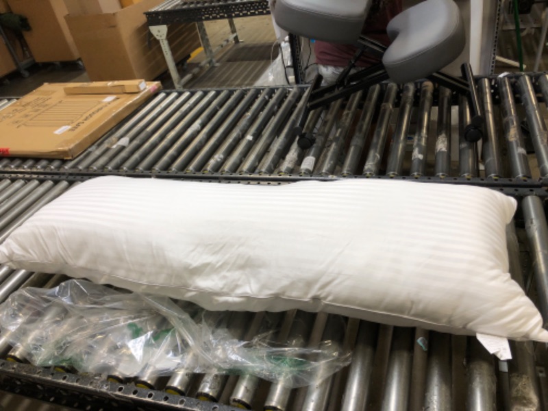 Photo 1 of 1 long white pillow 