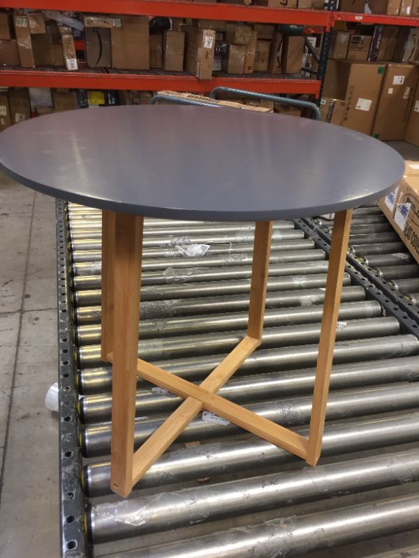 Photo 1 of  Round Dining Table With Grey TOP WOODEN -  no hardware