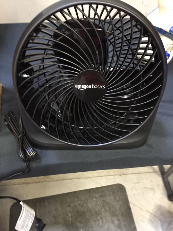 Photo 2 of Amazon Basics 3 Speed Small Room Air Circulator Fan, 7-Inch

