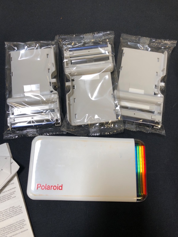 Photo 2 of Polaroid Hi-Print - Bluetooth Connected 2x3 Pocket Phone Photo Printer with 2 Polaroid Hi·Print 2x3 Paper Cartridges (30 Sheets) Buy as is