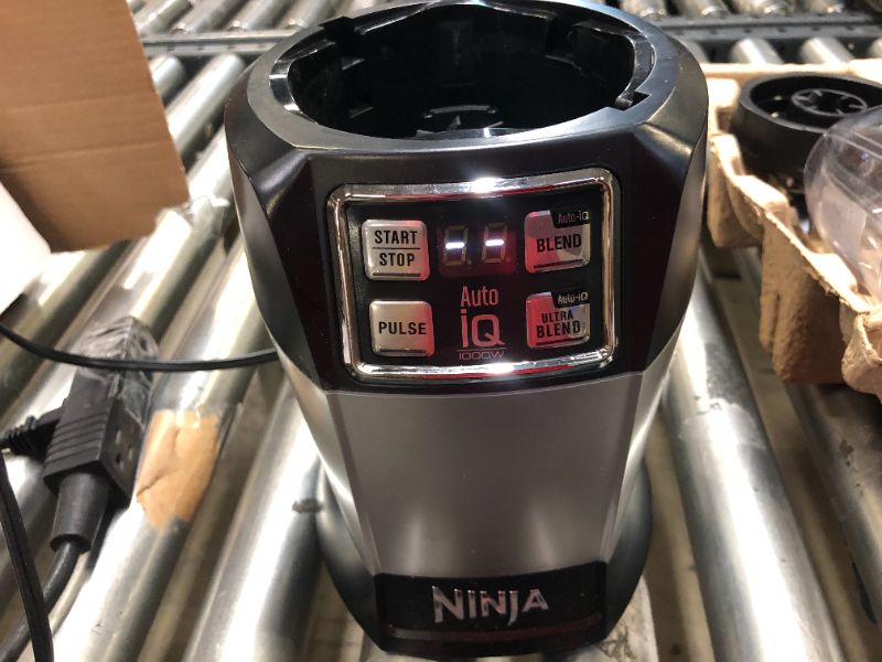 Photo 3 of Ninja BL480D Nutri Personal Countertop Blender, Auto-iQ Technology, 1000-Watts, for Frozen Drinks, Smoothies, Sauces & More, with 18-oz. & 24-oz. To-Go Cups & Spout Lids, Black/Silver
