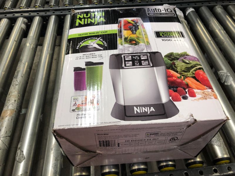 Photo 4 of Ninja BL480D Nutri Personal Countertop Blender, Auto-iQ Technology, 1000-Watts, for Frozen Drinks, Smoothies, Sauces & More, with 18-oz. & 24-oz. To-Go Cups & Spout Lids, Black/Silver
