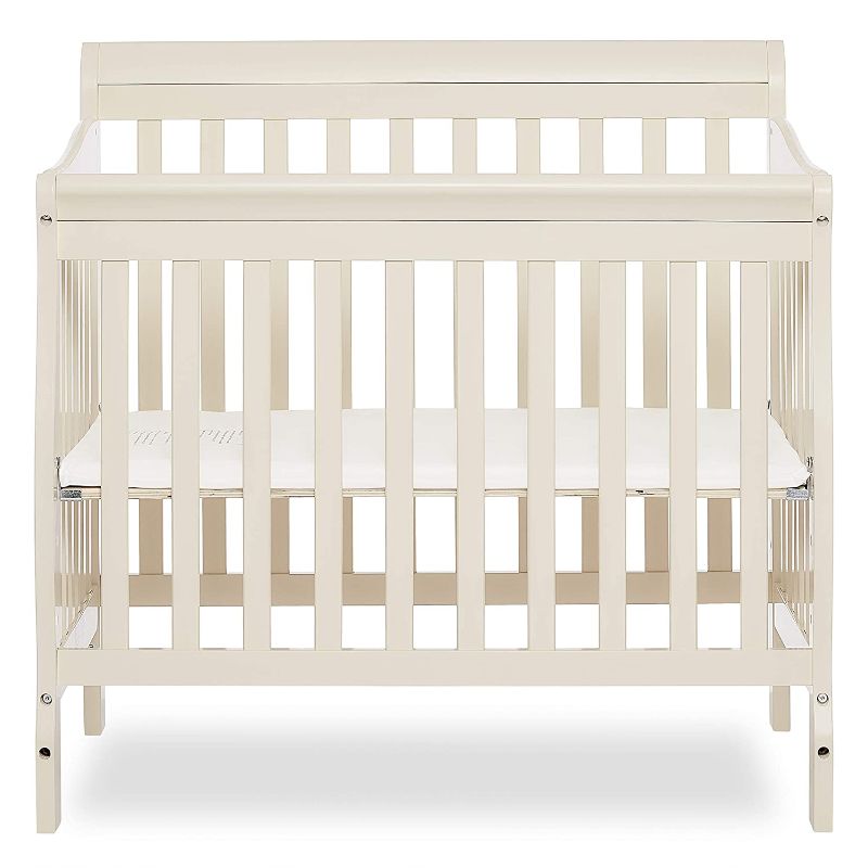 Photo 1 of Dream On Me Aden 4-in-1 Convertible Mini Crib in French White, Greenguard Gold Certified

