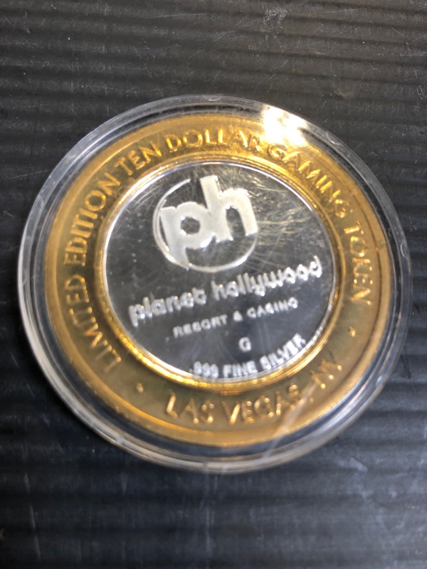 Photo 1 of .999 FINE SILVER ....COLLECTABLE LIMITED EDITION PLANET HOLLYWOOD CASINO GAMING TOKEN , TEN DOLLAR CASINO CHIP 