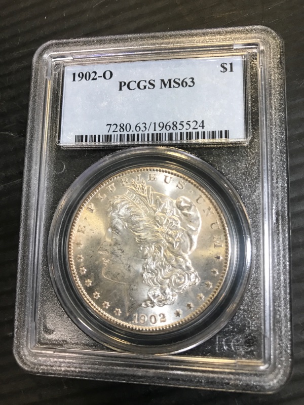 Photo 2 of 1902-O Morgan Dollar MS-63 PCGS , COLLECTABLE 1 DOLLAR COIN IN CASE 