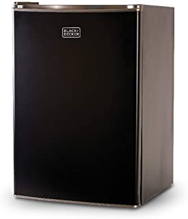 Photo 1 of BLACK+DECKER BCRK25B Compact Refrigerator Energy Star Single Door Mini Fridge with Freezer, 2.5 Cubic Feet, Black. no Bo Packaging, Item is new, item is damaged from shipping and handling, scratchs an scuffs on item, Dent on top corner. Item turns on did 