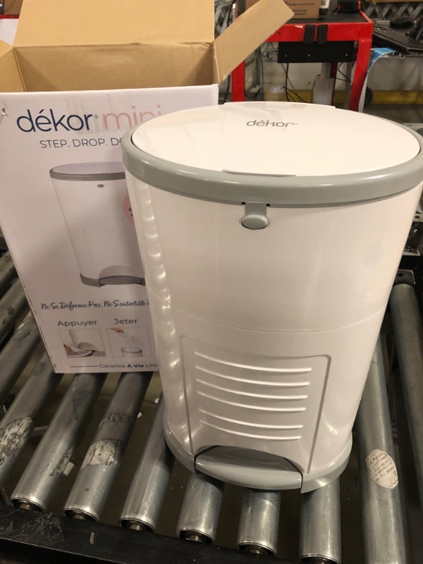 Photo 3 of Dekor Mini Hands-Free Diaper Pail | White | Easiest to Use | Just Step – Drop – Done | Doesn’t Absorb Odors | 20 Second Bag Change | Most Economical Refill System