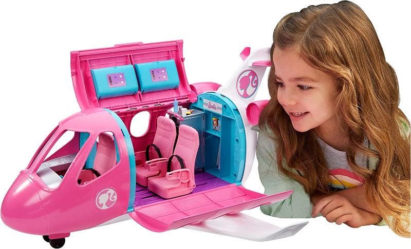 Photo 1 of Barbie Dreamplane Transforming Playset with Reclining Seats and Working Overhead Compartments, Plus 15+ Pieces Including a Puppy and a Snack Cart, for Kids 3 Years Old and Up
