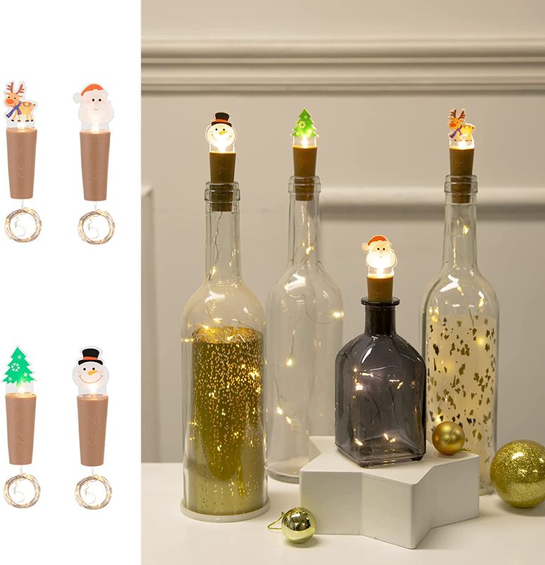 Photo 1 of 4 Pack 9 LED Wine Bottle Lights with Cork, Waterproof Mini Copper Wire, Battery Operated Fairy String Lights for Liquor Bottles, Santa Reindeer Snowman Tree Starry Lights for Christmas (Warm White)
