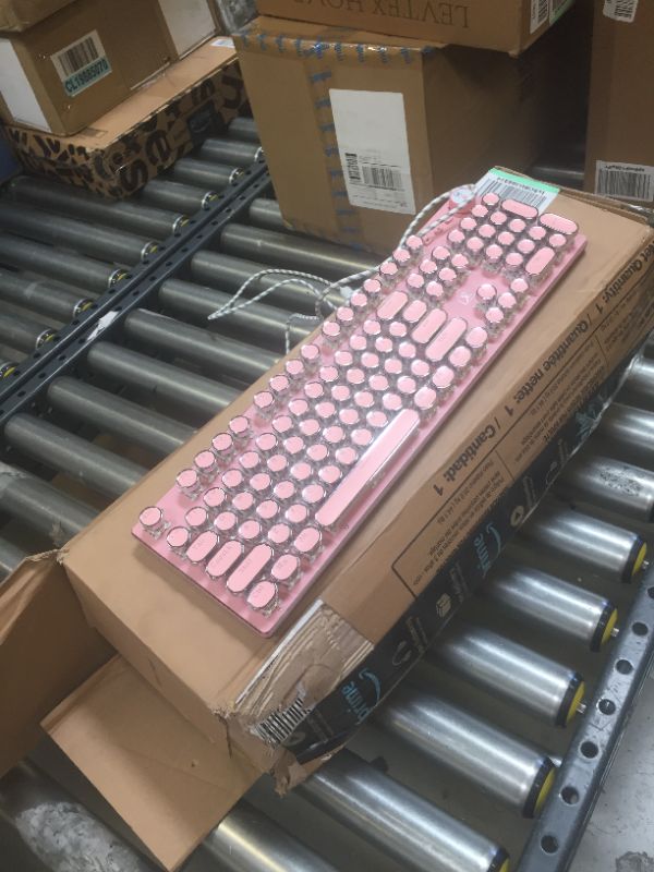 Photo 3 of pink key board 