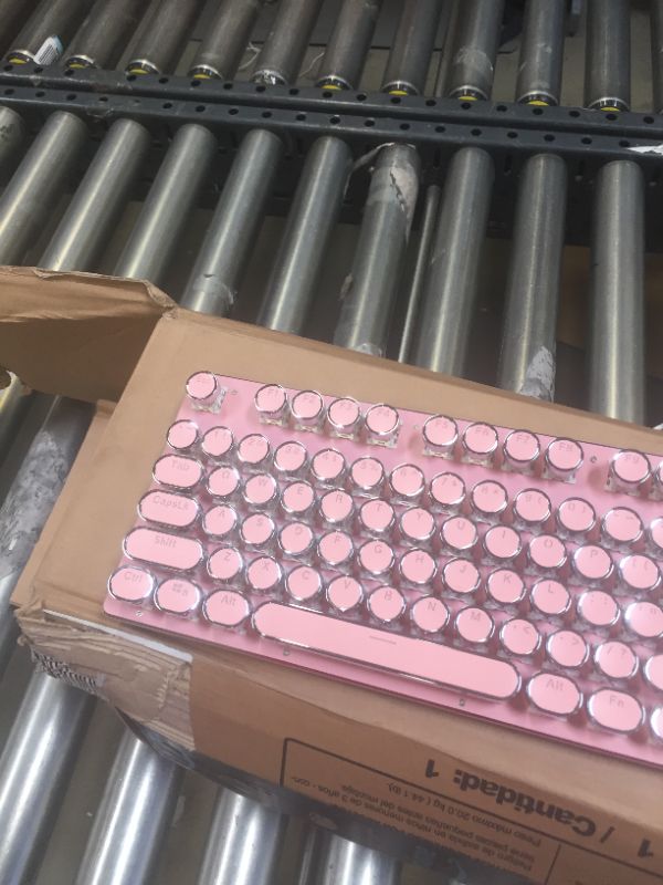 Photo 2 of pink key board 