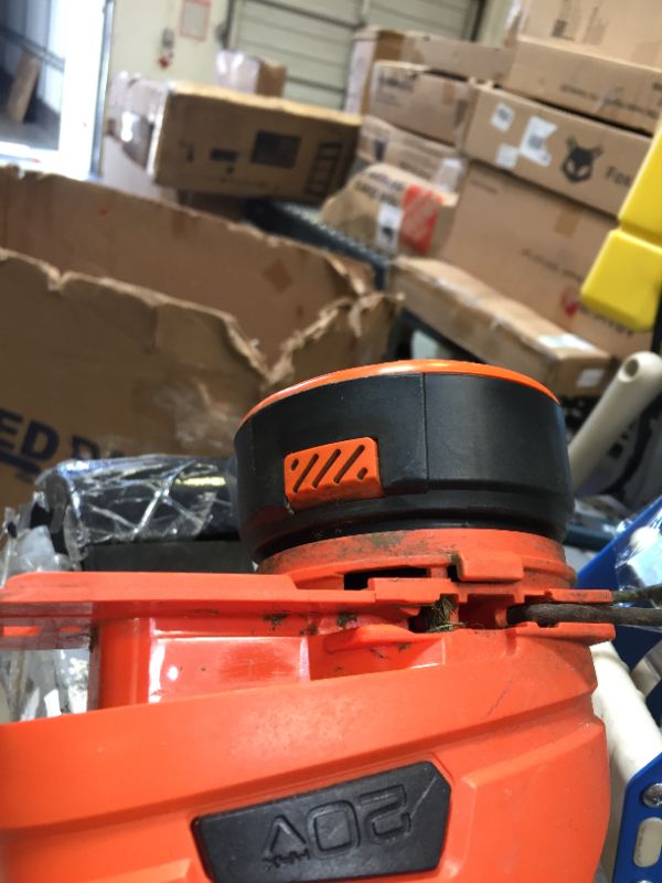 Photo 1 of Black & Decker MTC220 Max Cordless Lithium-Ion 3-in-1 Trimmer/Edger & Mower, Orange/ Black
