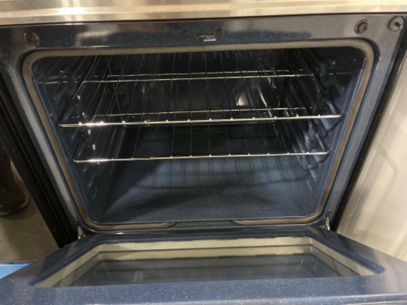 Photo 3 of 6.3 cu. ft. Smart Freestanding Electric Range with Rapid Boil™ & Self Clean in Stainless Steel *COSMETIC DAMAGE, NO ACCESSORIES INCLUDED.
