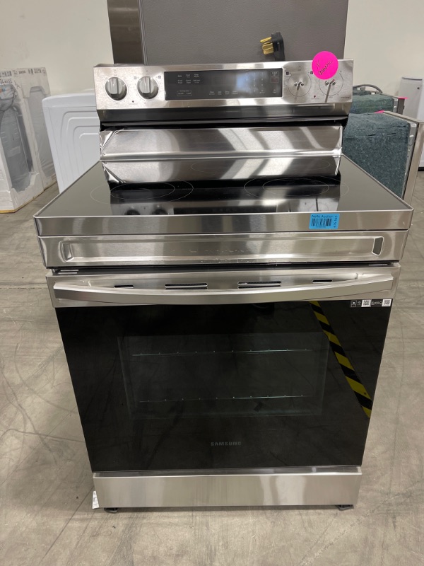 Photo 2 of 6.3 cu. ft. Smart Freestanding Electric Range with Rapid Boil™ & Self Clean in Stainless Steel *COSMETIC DAMAGE* 
