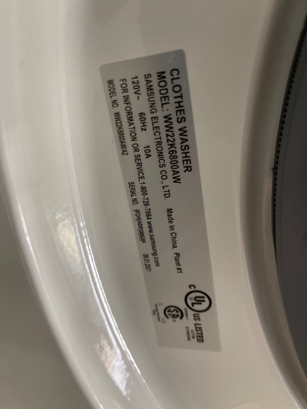 Photo 1 of 2.2 cu. ft. Compact Front Load Washer with Super Speed in White *COSMETIC DMG*
