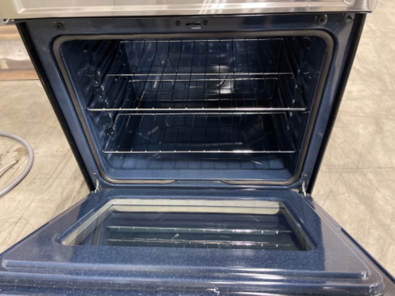 Photo 1 of 6.3 cu. ft. Smart Freestanding Electric Range with Rapid Boil and Self Clean in Stainless Steel *COSMETIC DAMAGE* 