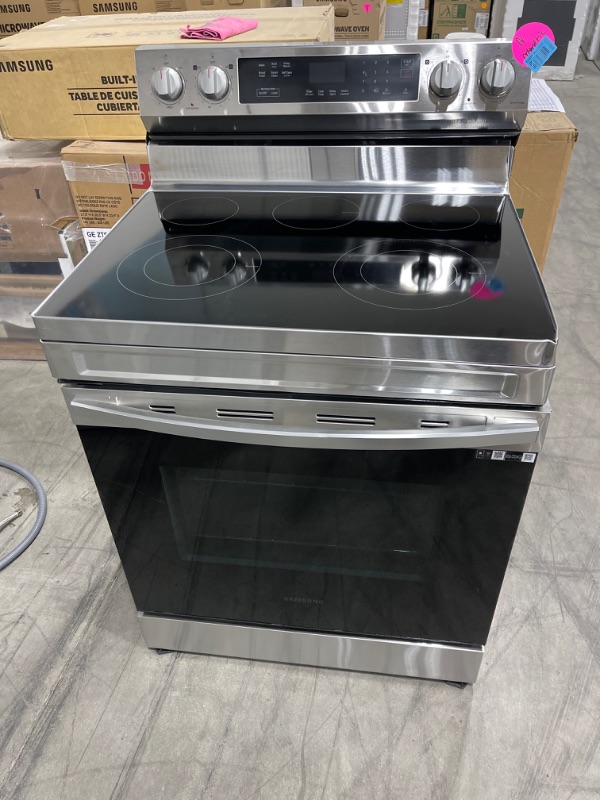 Photo 2 of 6.3 cu. ft. Smart Freestanding Electric Range with Rapid Boil and Self Clean in Stainless Steel *COSMETIC DAMAGE* 