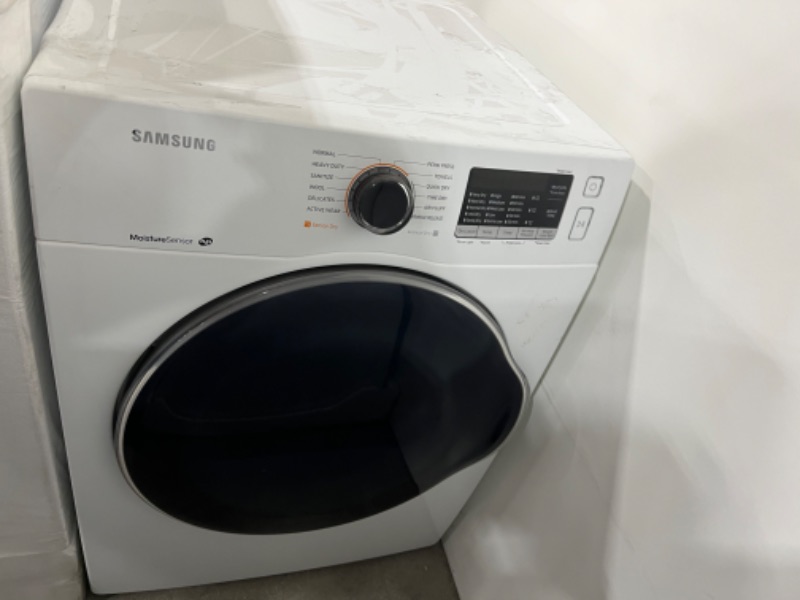 Photo 2 of Samsung DV22K6800EW/A1 DV22K6800EW 4.0 cu. ft. Capacity Electric Dryer White
 - mechanical issue - small dent on top