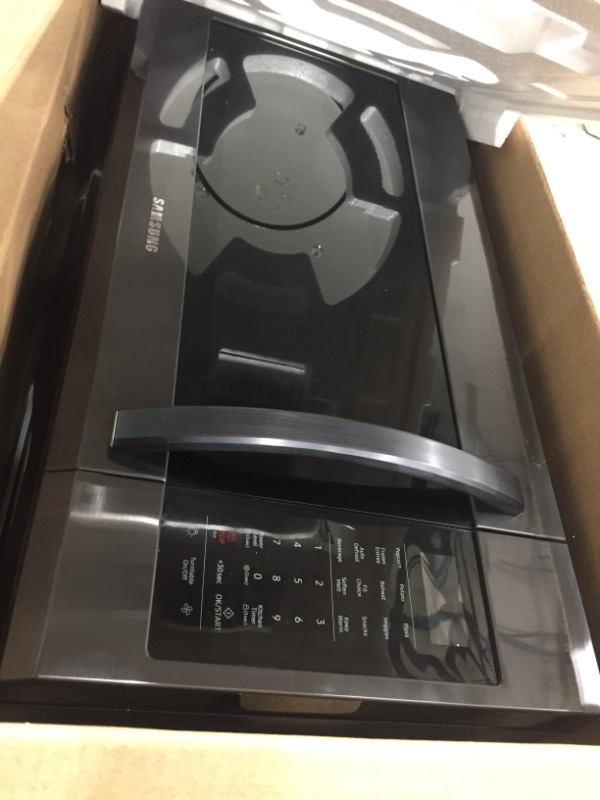 Photo 1 of 1.9 Cu. Ft.  Over-the-Range Microwave with Sensor Cook