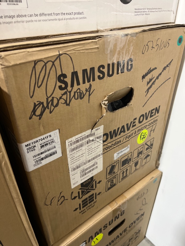 Photo 2 of Samsung ME19R7041FS 1.9 Cu.Ft. Stainless Steel Over-The-Range Microwave - factory sealed