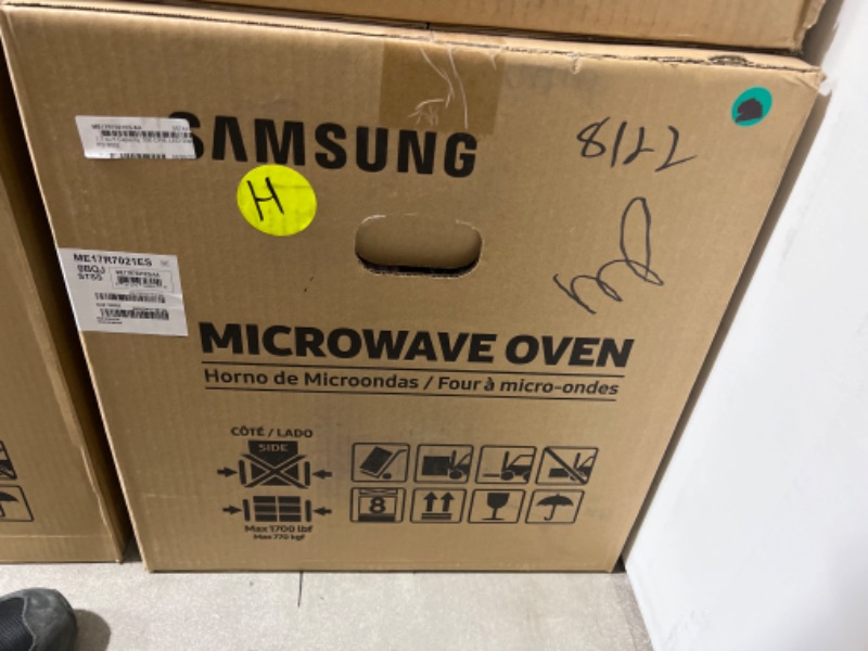 Photo 2 of Samsung 1.7 Cu. Ft. Fingerprint Resistant Stainless Steel Over-The-Range Microwave - factory sealed