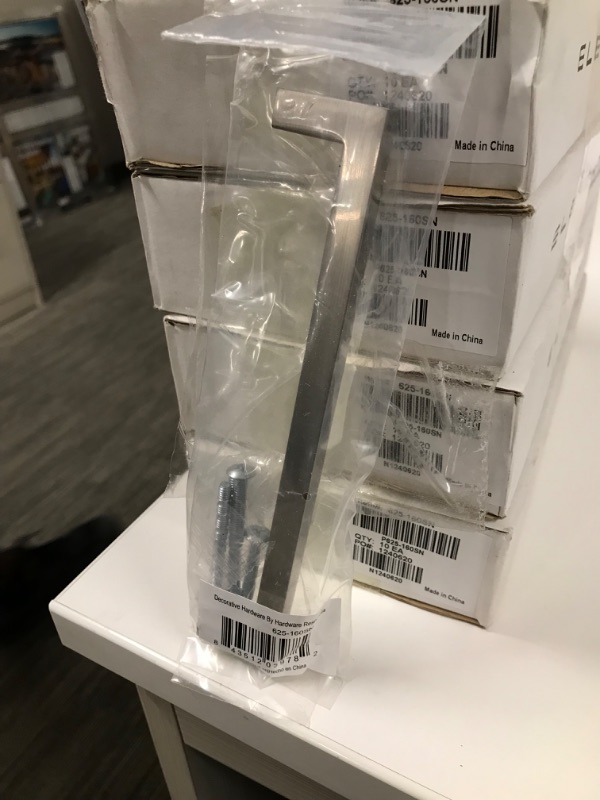 Photo 1 of Elements Stanton Cabinet Pull   Mounting Holes: 6-5/16 in. (160mm)
Overall Length: 6-5/8 in. (168mm)
Projection: 1-1/8 in. (29mm)
Finish: Satin Nickel