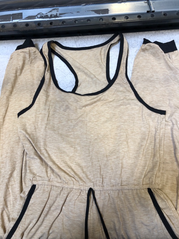 Photo 1 of BEIGE AND BLACK ROMPER SIZE M
